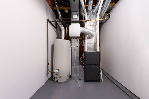 white gas water heater in storage room