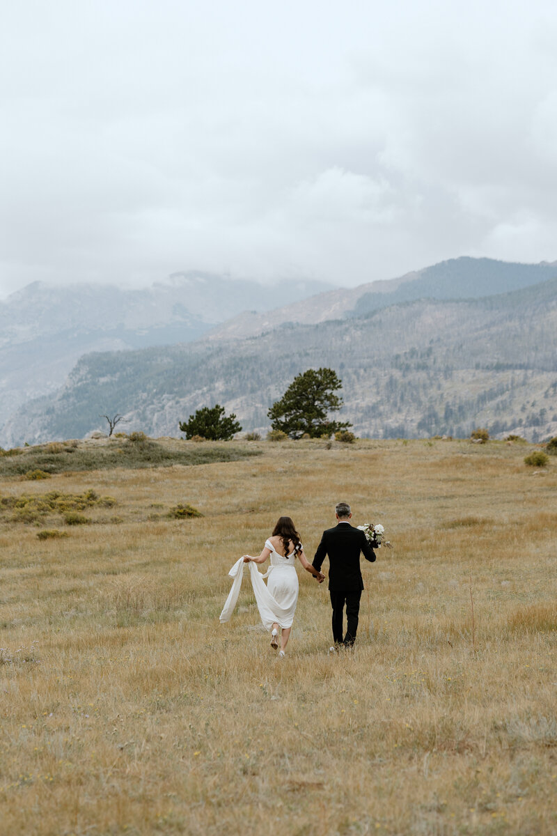 Forest elopement ceremony under a canopy of ancient trees in the PNW