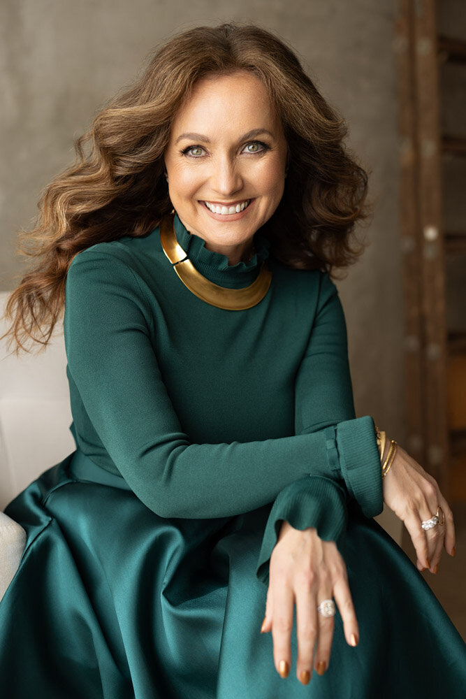 Gabriella taylor in a green dress smiling