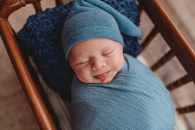 Newborn Baby posed for Newborn Photos in Asheville, NC.