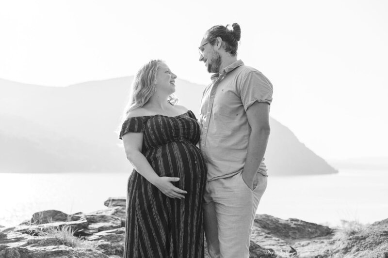 Candid Hudson Valley maternity photos in Cold Spring with playful prompts and warmth