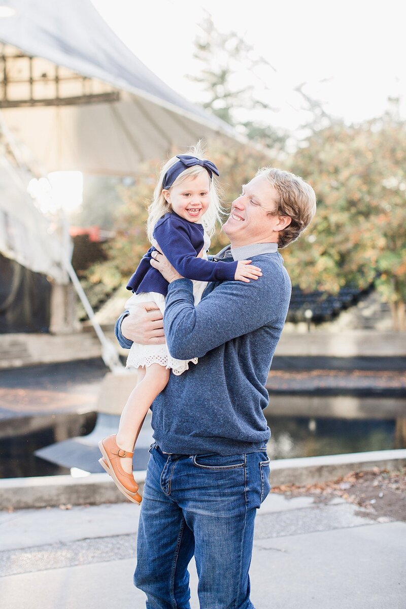 dad holding daughter by knoxville wedding photographer, amanda may photos