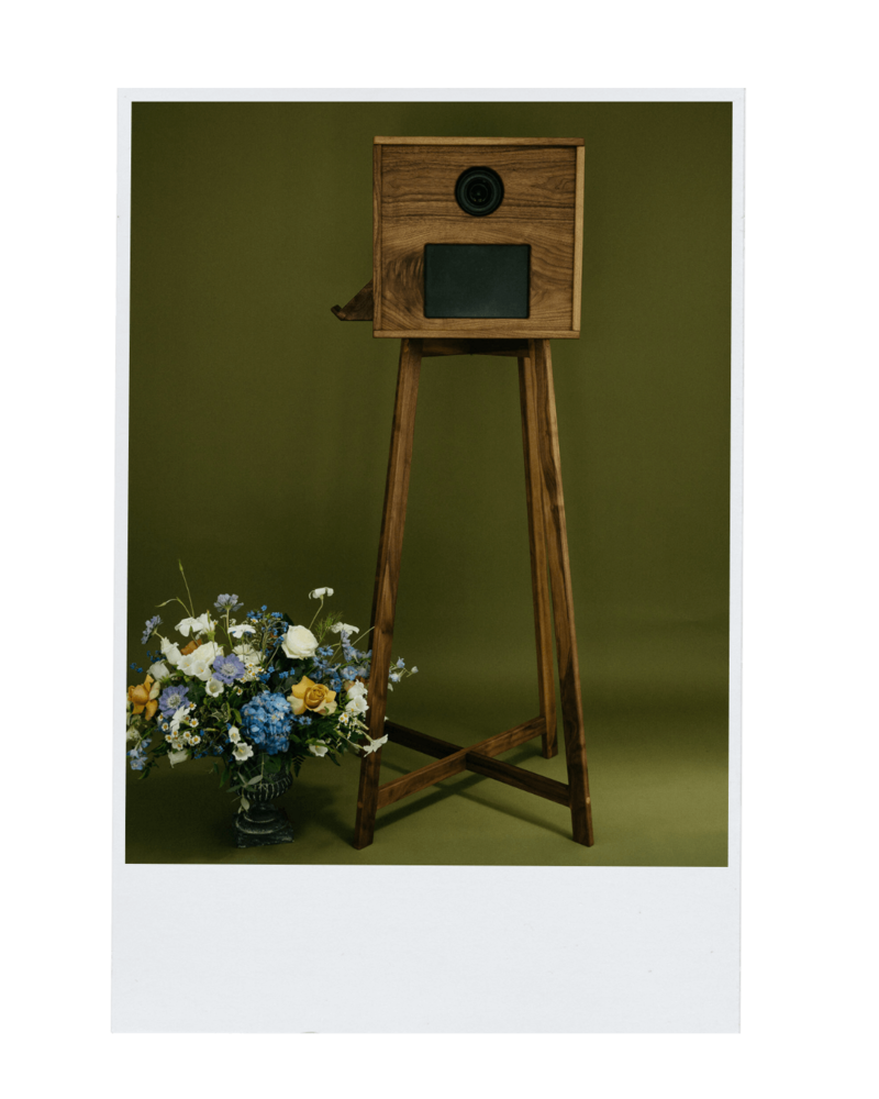 Polaroid style photo of the Birdie booth, an open air style photo booth for weddings.
