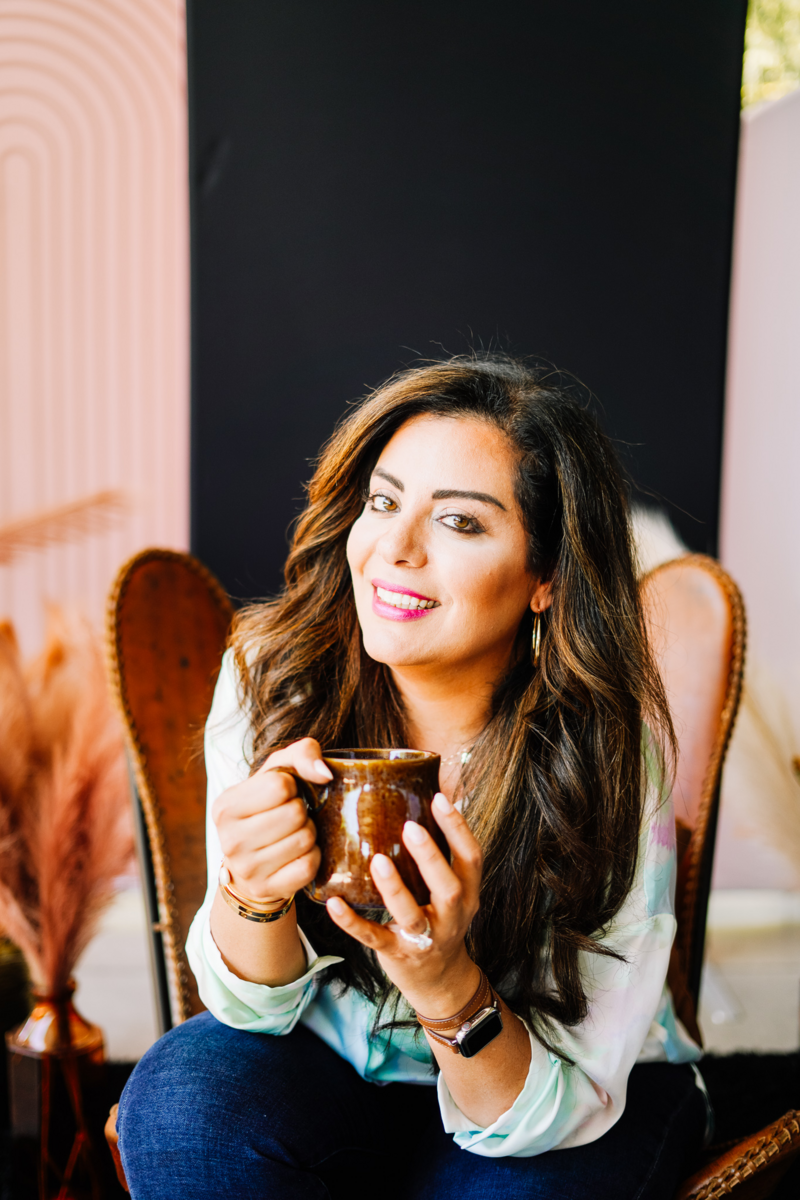 Rana Sabra with cup of coffee