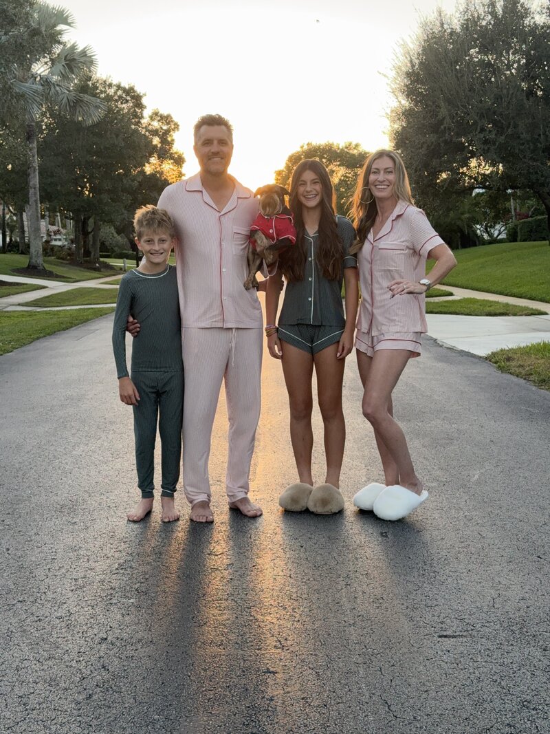 a woman's hand by an EGP Get Started Guide booklet