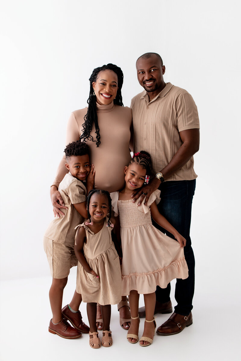Studio maternity session with family and children