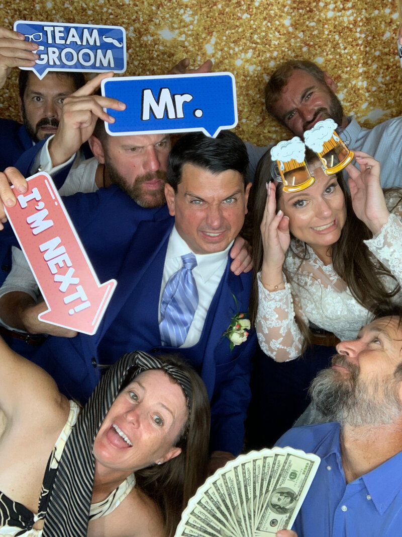 Bride and Groom posing in photo booth with wedding guests | Party Pix Digital Photo Booth | Virginia Beach