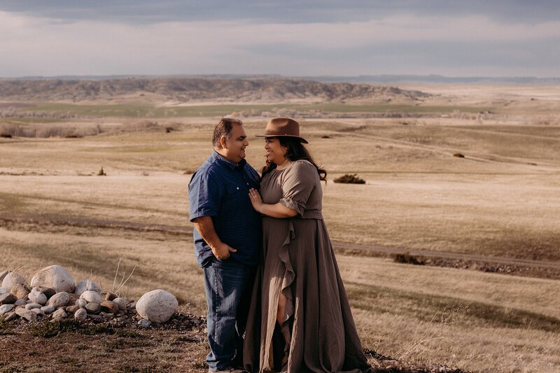 Inland Empire Photographer. Vanessa and her husband with the Montana Big Sky in the background.