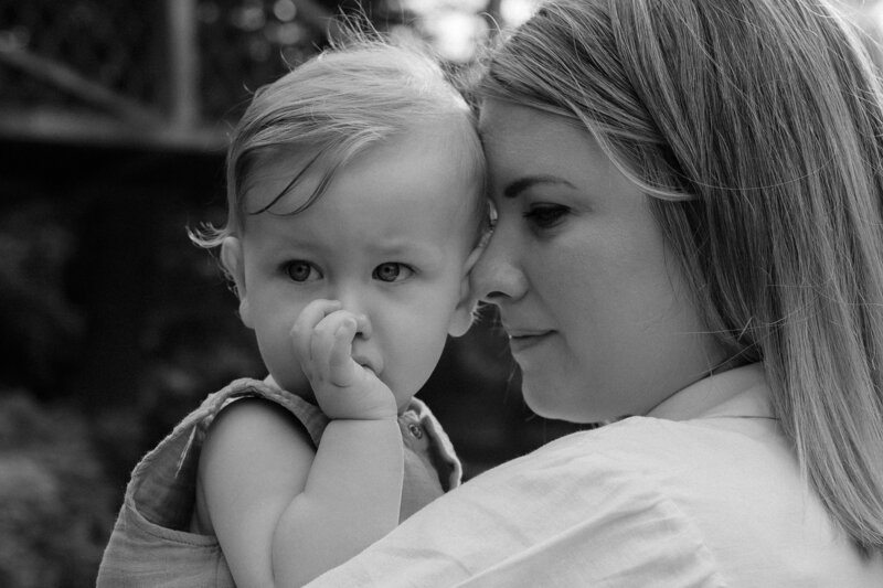 Close-up of a baby and mom's face
