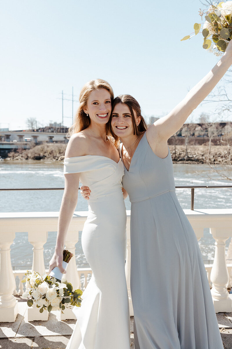 Bride and bridesmaid at wedding in Downtown Philadelphia