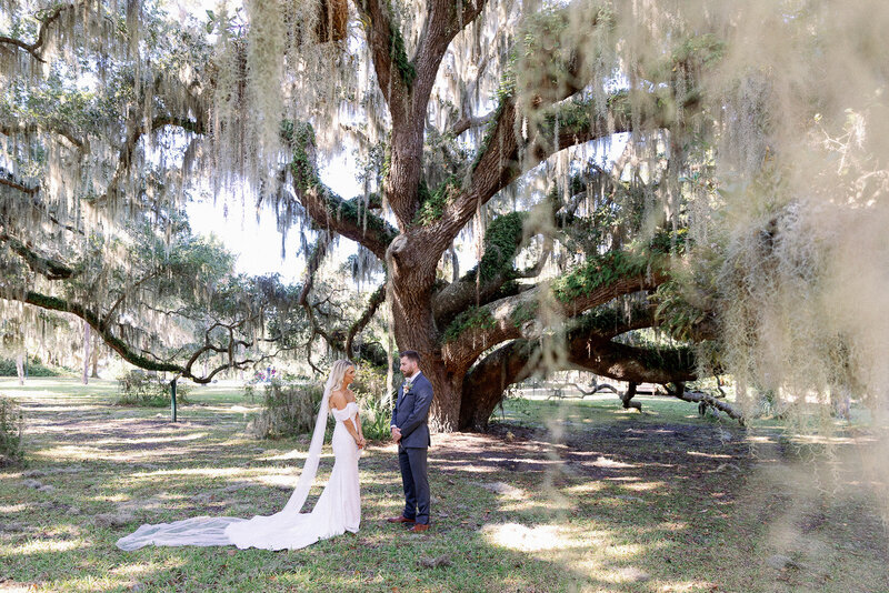 just married husband and wife celebrate by friends and family at Jekyll island