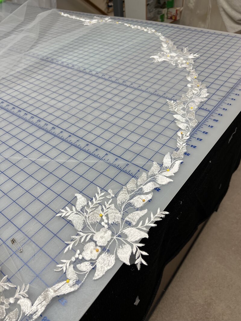 custom lace bridal veil being fabricated