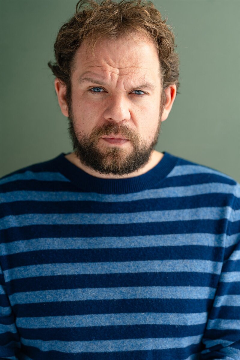 A professional acting headshot in a Charlotte NC photo studio