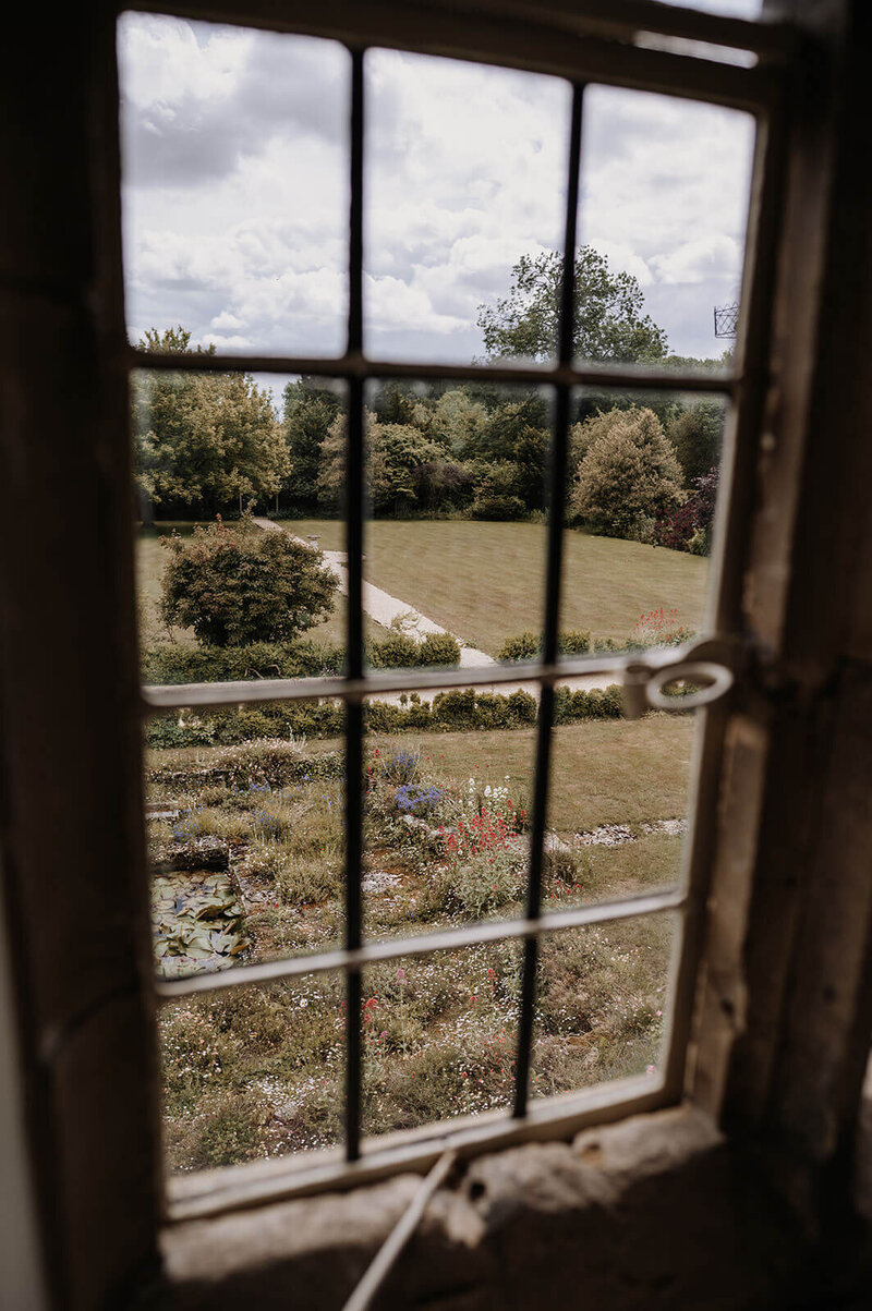 View across the Caswell House estate from a traditional sash window