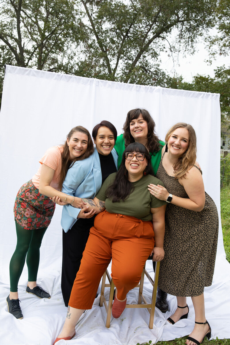 Description: A group of women posing for a photo at an Austin wedding.