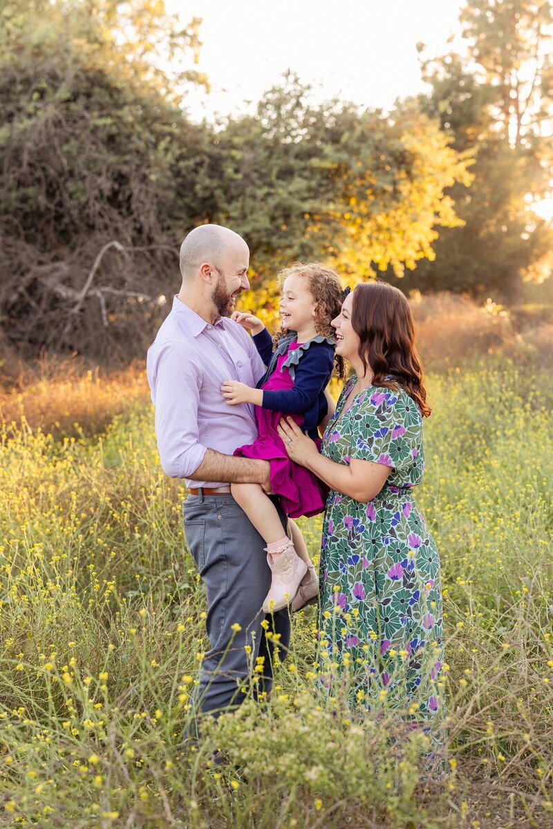 bright and colorful family photo in LA flower field