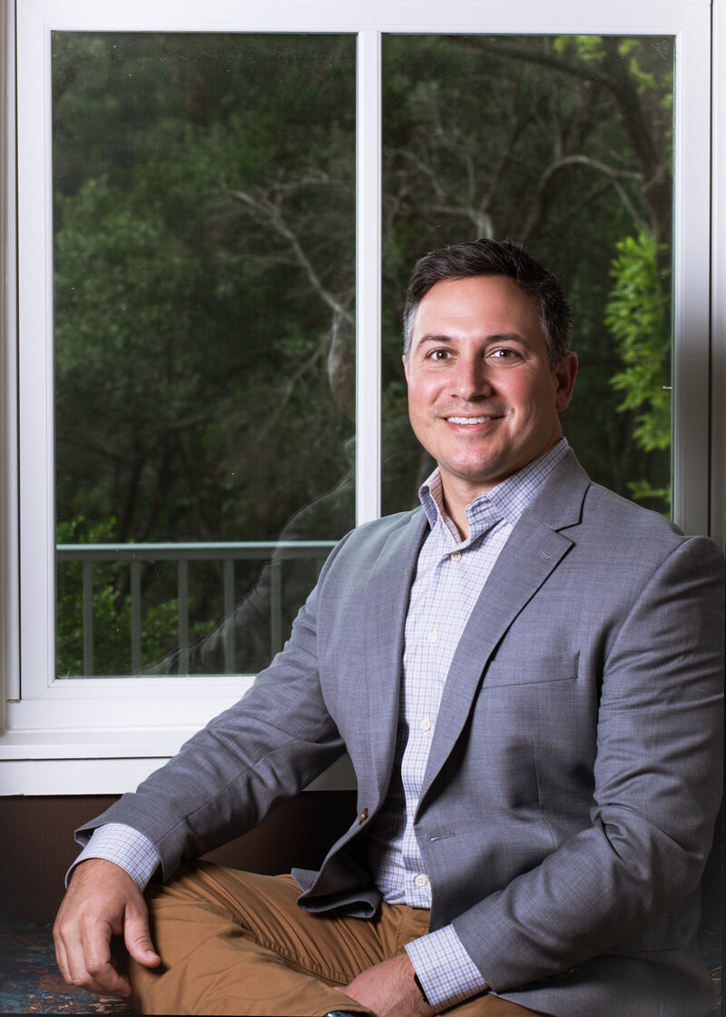 jonathan ramirez headshot by sean mendoza photography. hispanic male business owner. dripping springs interior design firm