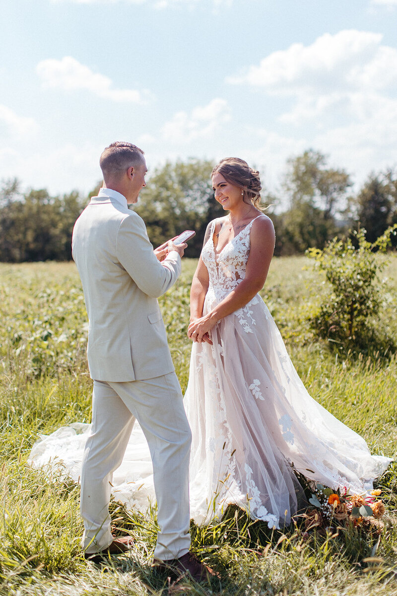bride and groom smiling St. Louis Wedding Photographers