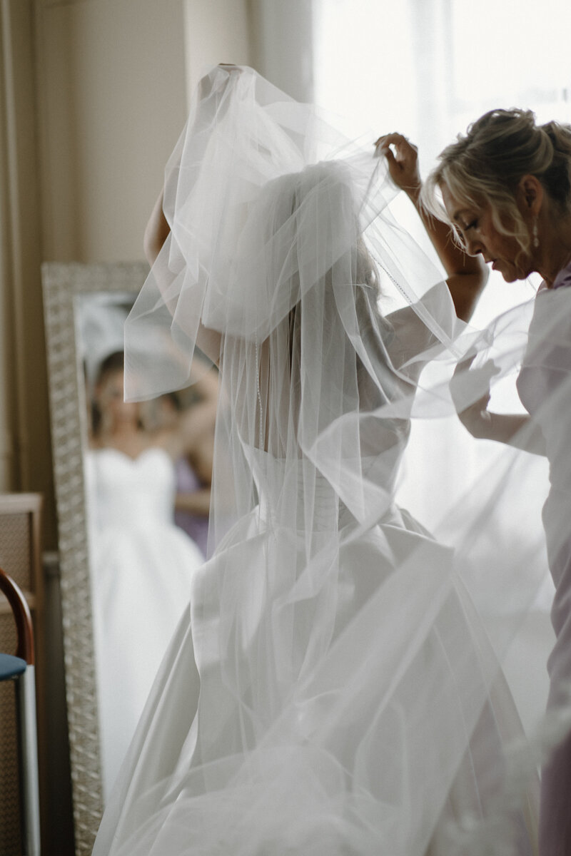 A BRIDE FLIPS HER WEDDING VEIL