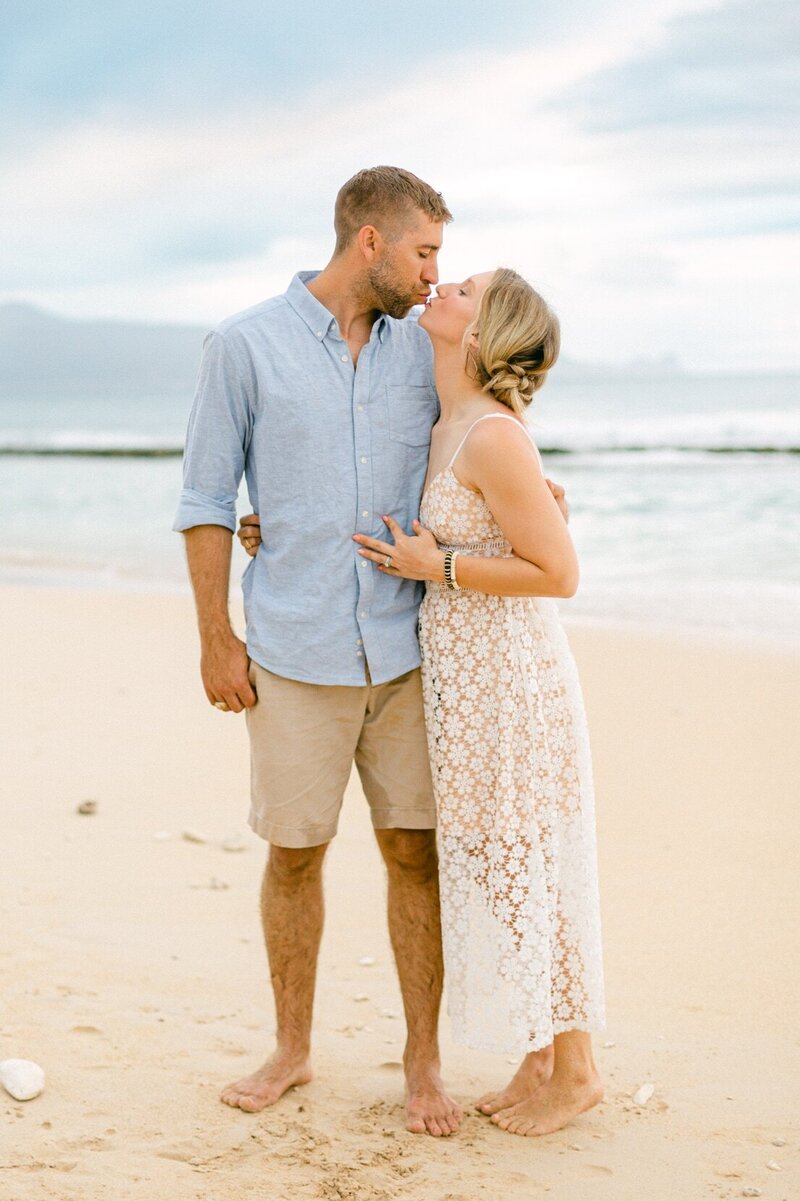 Couple kissing on Maui North Shore beach