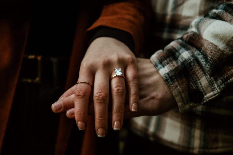 Discover the serenity and beauty of the Pacific Northwest through this enchanting photo of a marriage proposal by a stunning waterfall. Perfect for couples who love the grandeur of nature.
