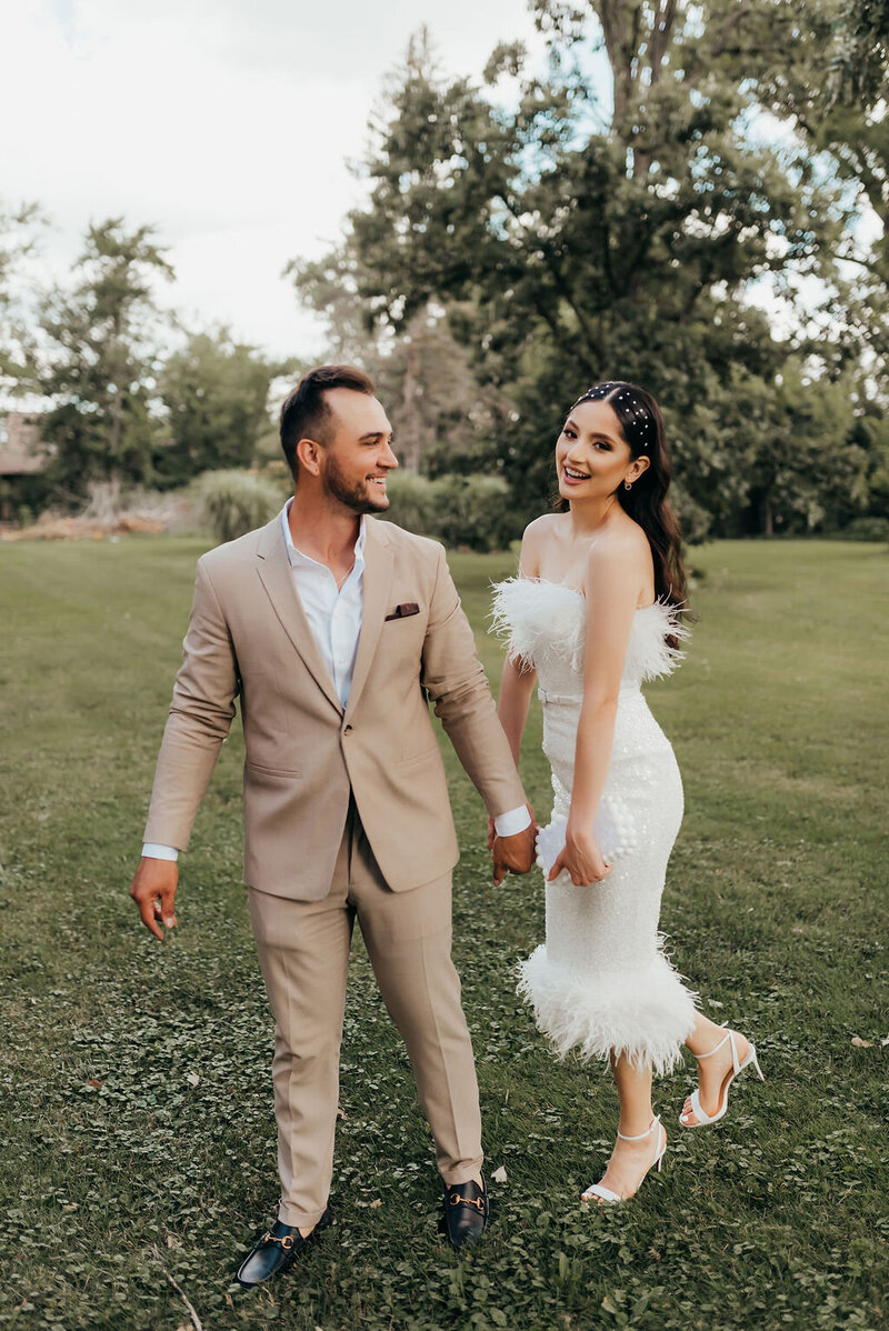 Joyful wedding photo of bride and groom in downtown Chicago