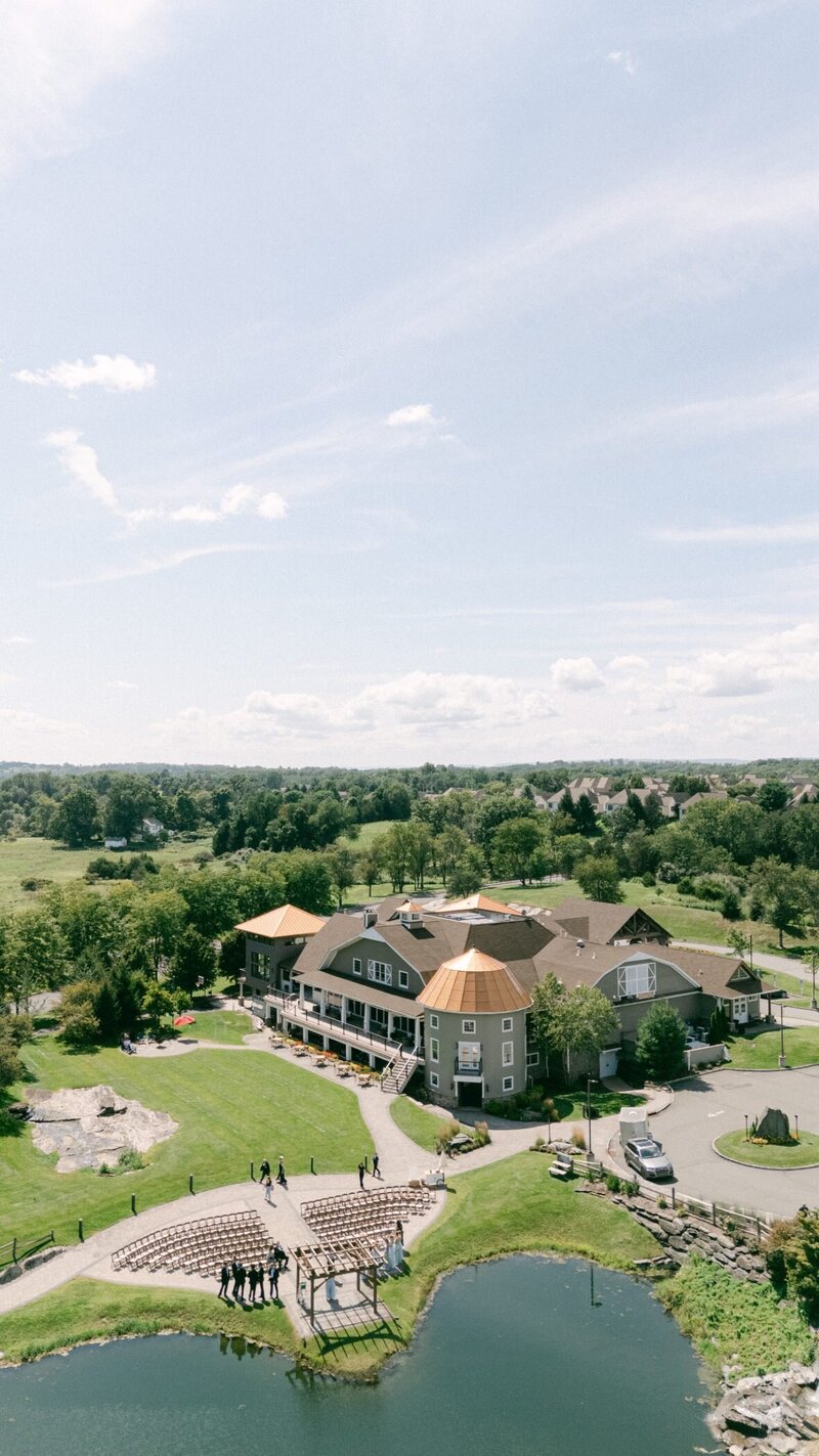 Aerial view of Bear Brook Valley in Fredon, New Jersey, with the ceremony set up beside the pond