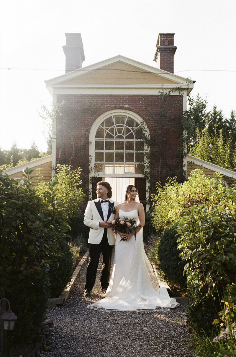 Couple takes golden hour portraits on 35mm film on their wedding day at Boscobel House & Gardens