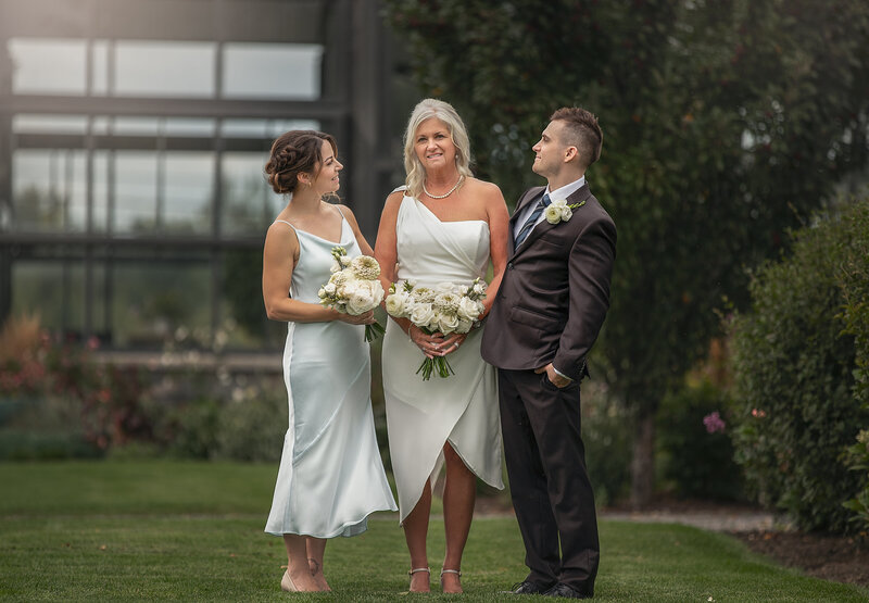 "A family portrait featuring parents and children, showcasing the strong bonds of love in a timeless portrait session in Ottawa."