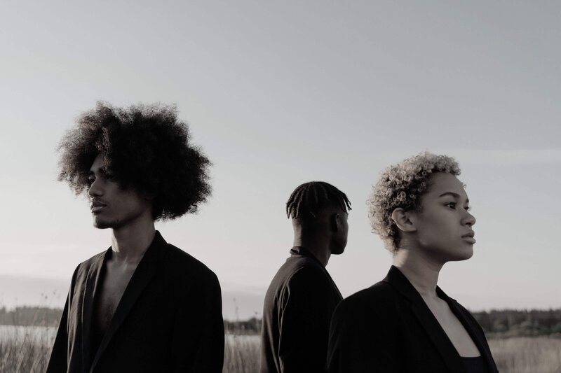 Young People Wearing Black Blazers