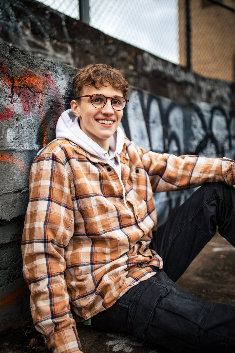 Ethan Heidi's oldest son in his mom's favorite Photo by the river downtown.
