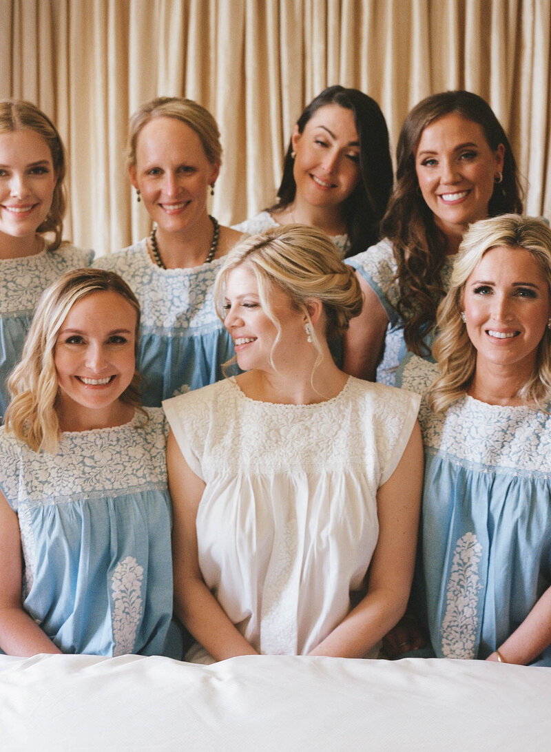 Bride and bridesmaids in pajamas before wedding