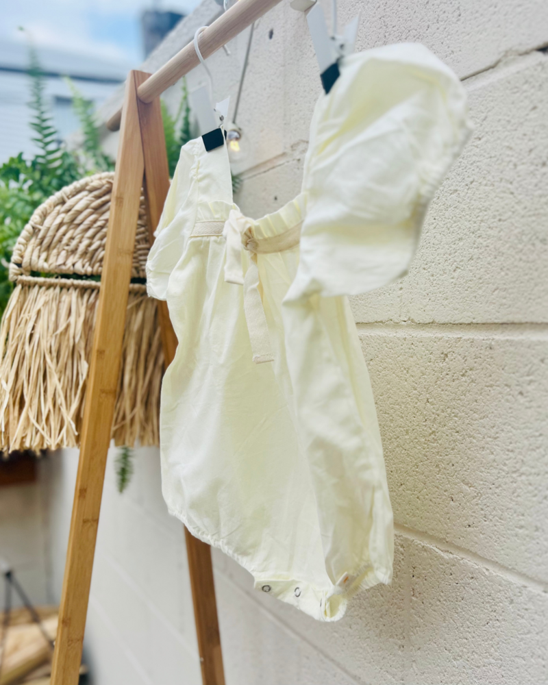 Cream Romper (side)