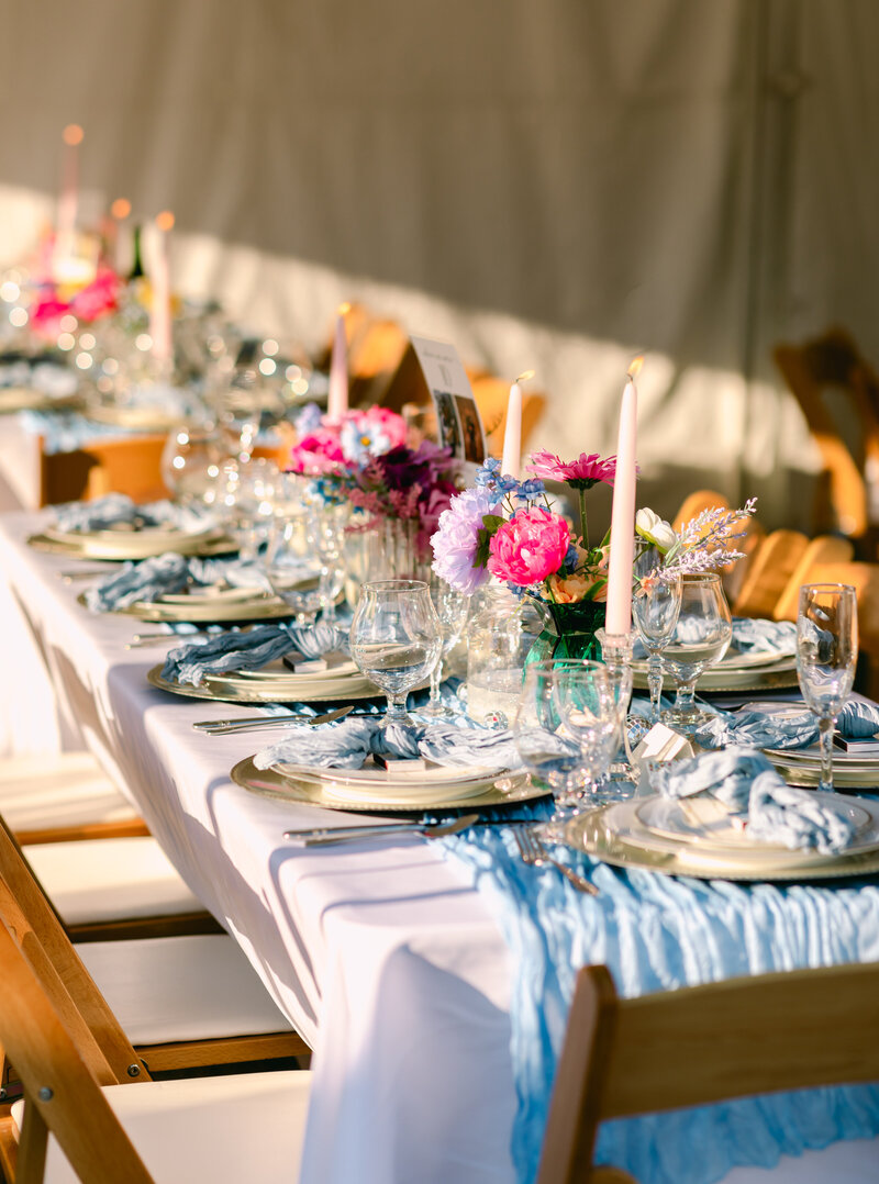 Inside the Cottage at Riverbend tent with colorful yet neutral decor details