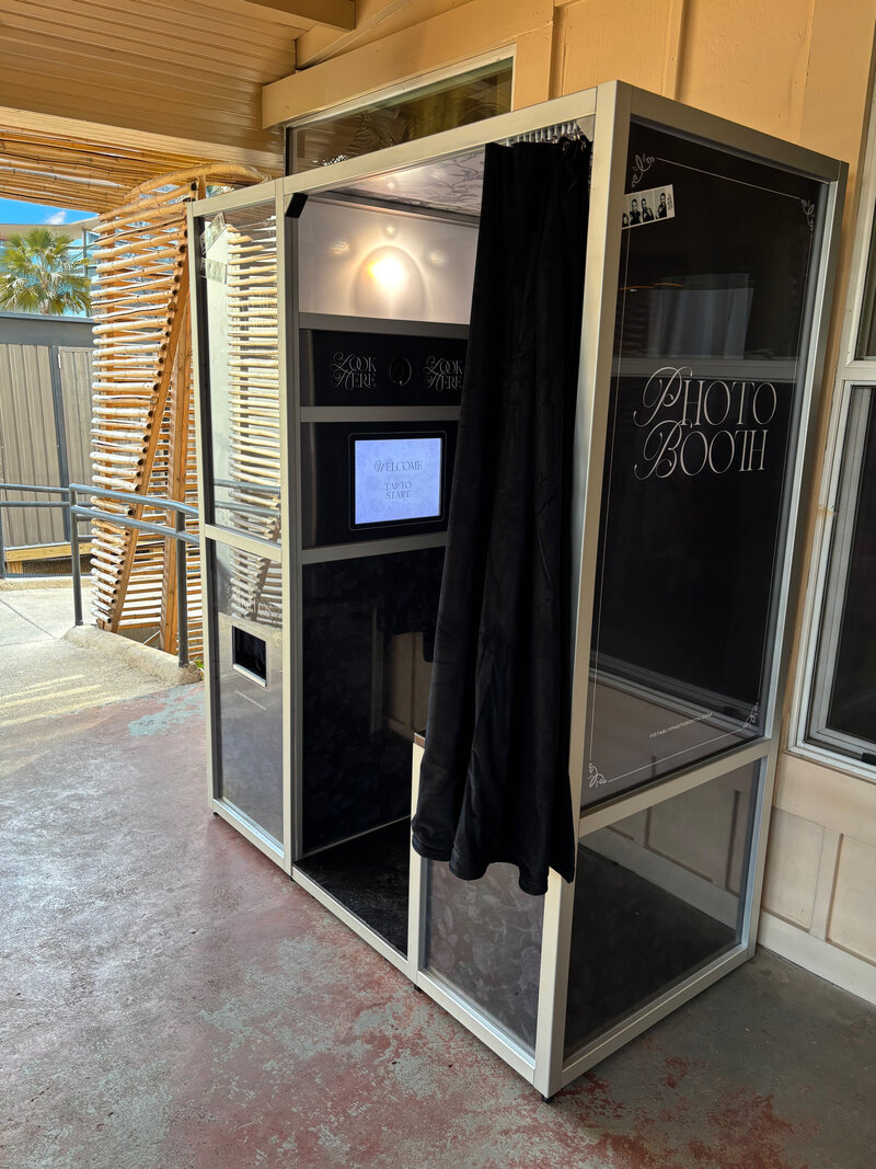 Classic enclosed photo booth with velver black curtain