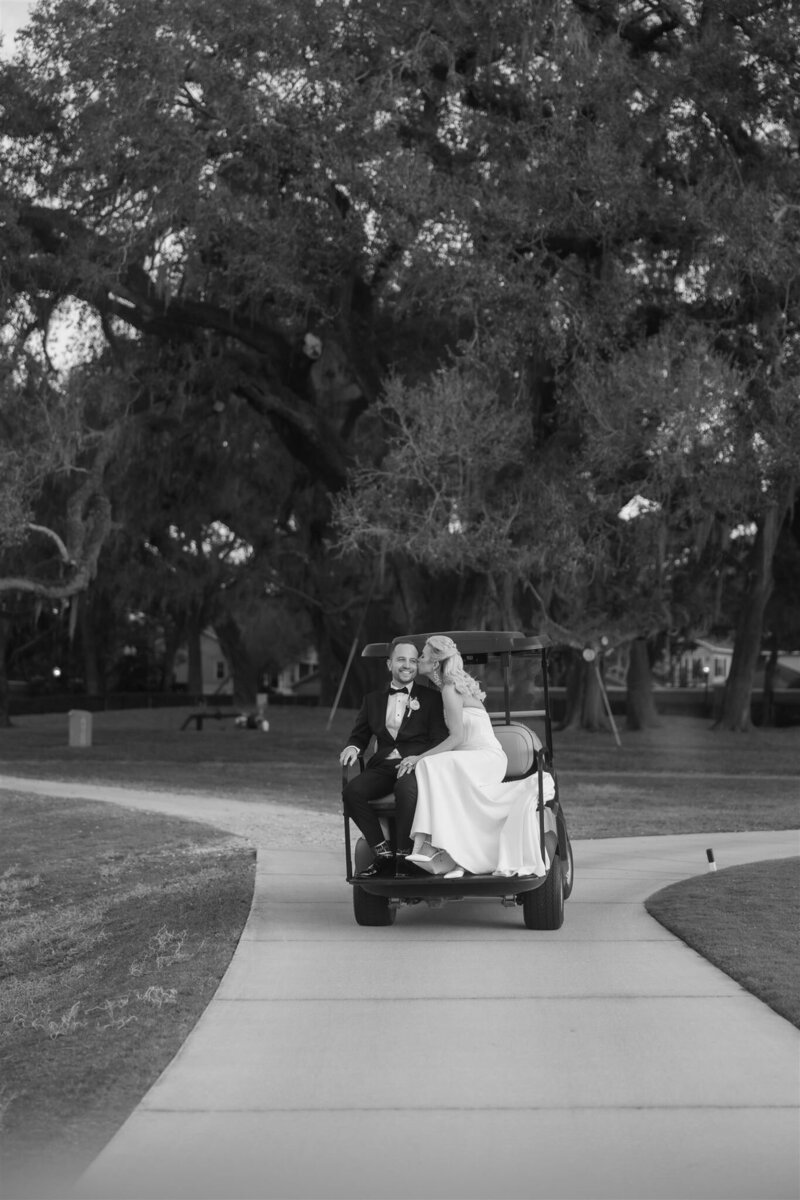 Bride and Groom Portrait on a golf course at the Country Club of Orlando by Orlando wedding photographer