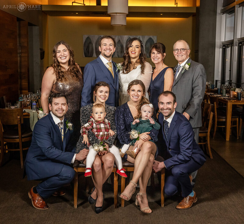 Family Photos inside of Coohills Restaurant at a Winter Wedding in Denver CO
