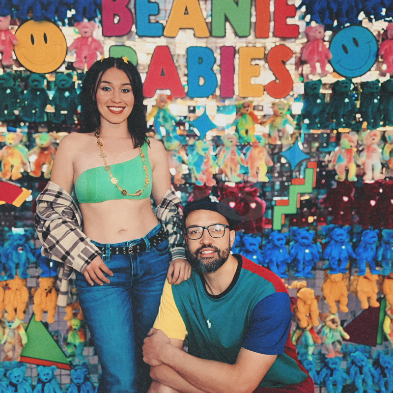 Two guests posing in front of a colorful, nostalgic Beanie Babies-themed backdrop, captured by MISGIF’s custom photo booth for corporate events and brand activations in Phoenix, Arizona