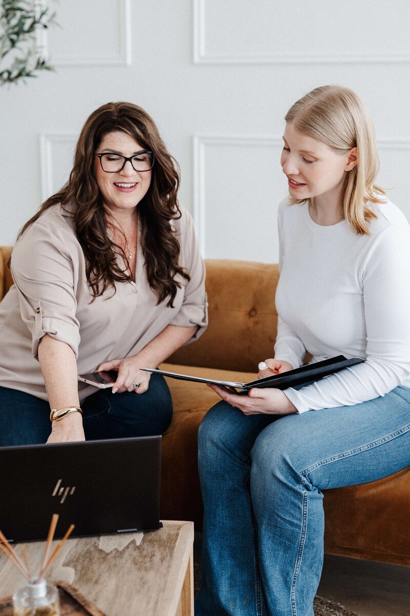 Stephanie and Melissa looking at computer