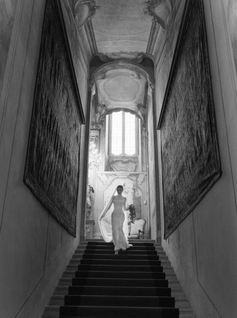Bride during her villa Sola Cabiati wedding, walking down the staircase and wearing a Galia Lahav wedding dress, by Lake Como Wedding Photographer Andreas K. Georgiou