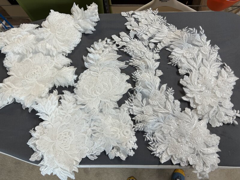 lace appliques ready for placing on a custom lace bridal veil