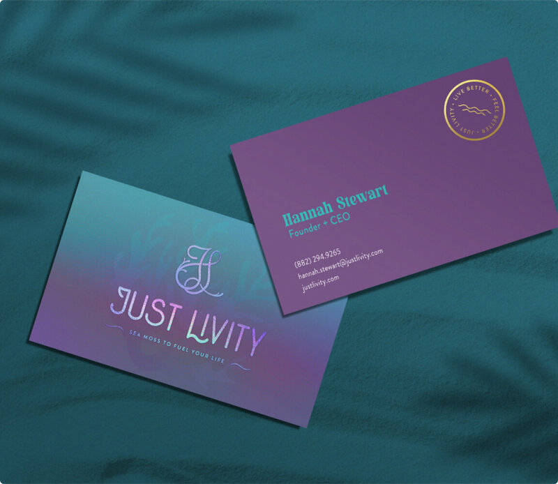 Front and back view of Just Livity business card, showing sea-green' and purple colors.
