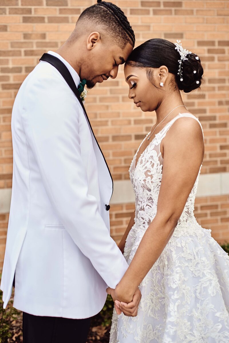 Wedding Couple pose in woods in Rochester Hills, Michigan