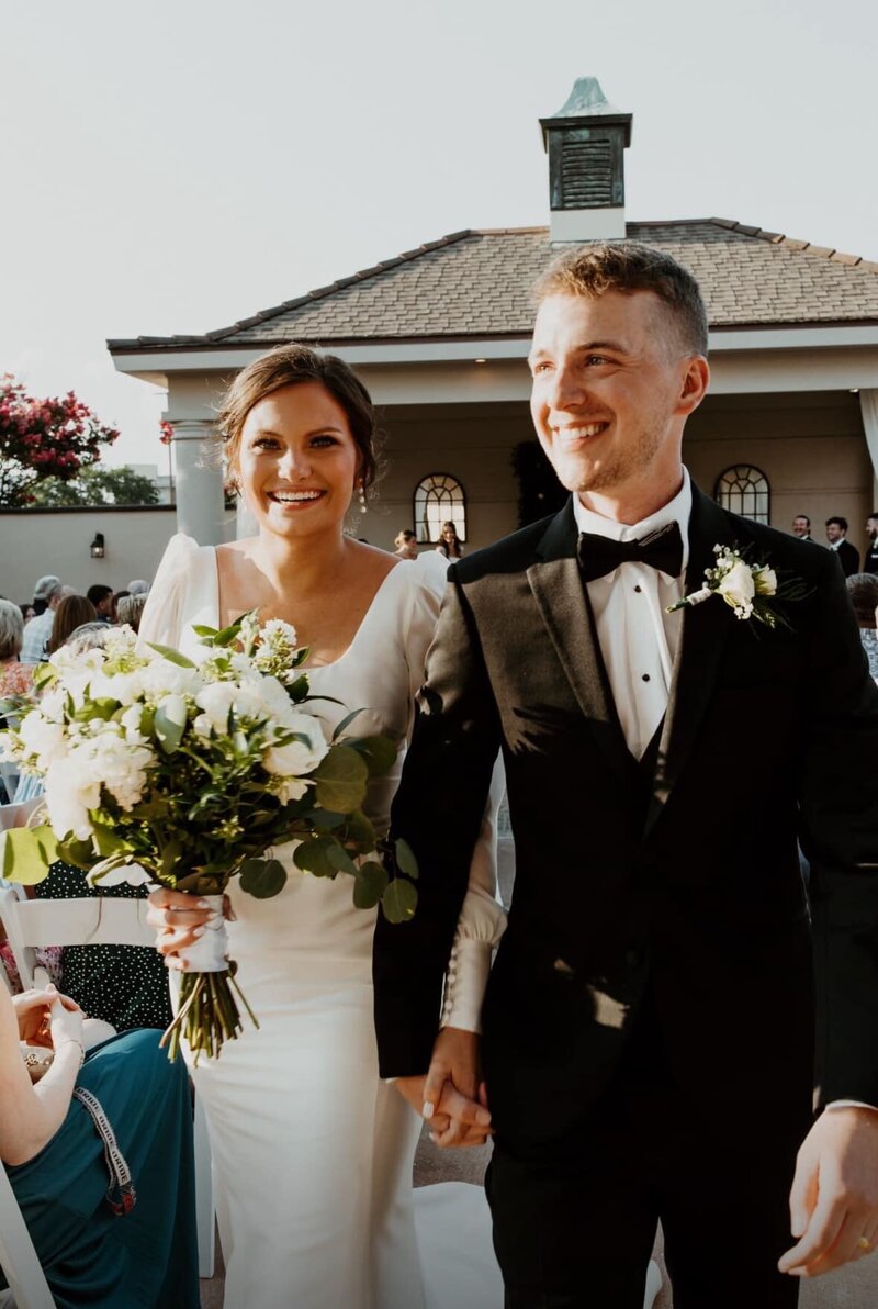 Expert Houston makeup artist creating a natural bridal glow for a modern Houston bride-to-be during a Houston wedding.