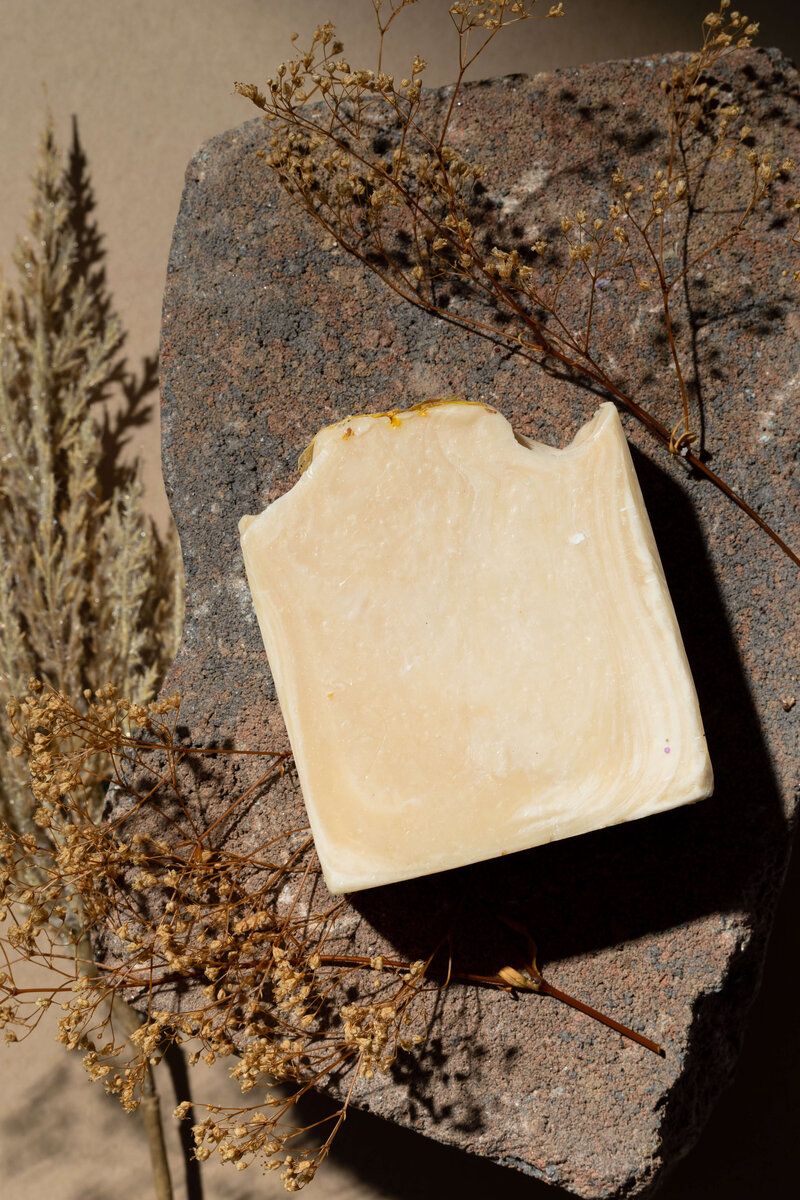 Product Photo of Soap on a rock with rustic florals