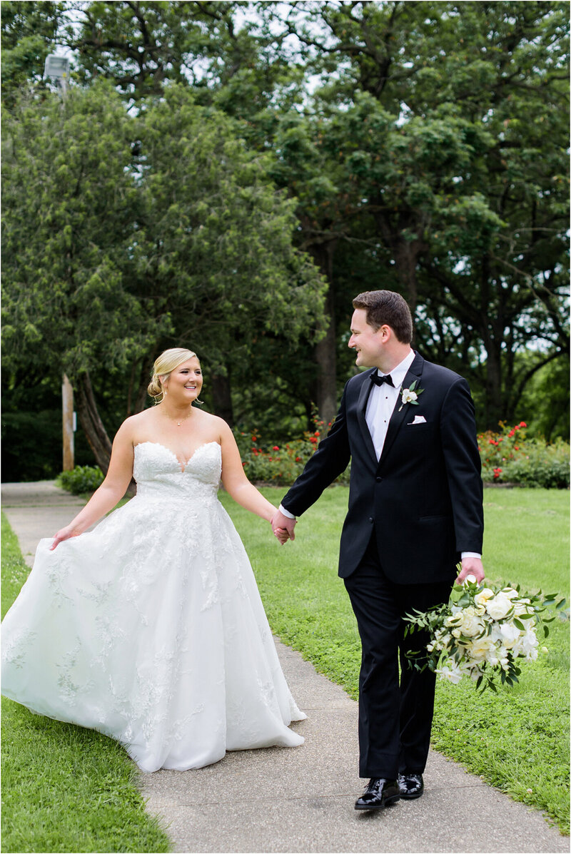 Bride and Groom Portrait surrounded by beautiful pink roses