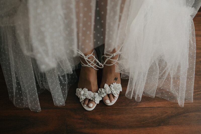 brides detail photos of shoes before the moondog brewery wedding in Collingwood