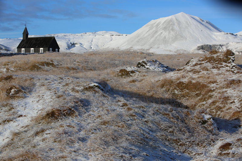 Light Shifter Studios   captures a snowy landscape travel photo in west Iceland. 
