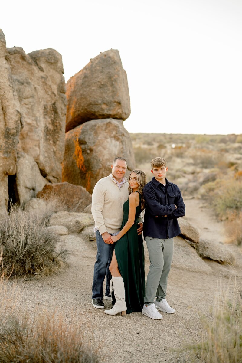 Extended Family posing for family photos  in Silverleaf Neighborhood in Scottsdale Az