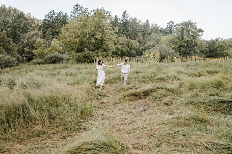 couple walking in the meadow